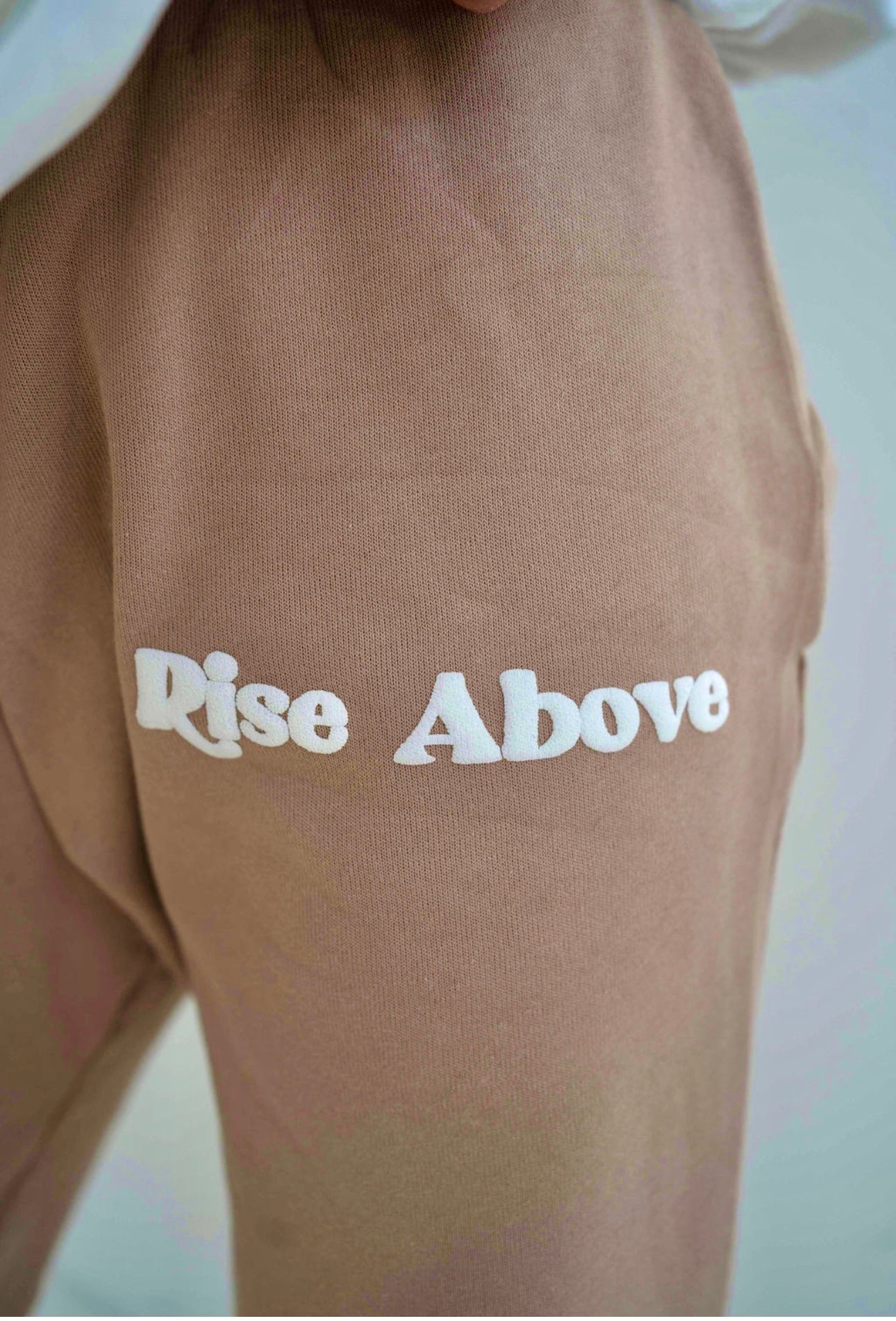 Welcome To Peak Tan Rise Above Joggers